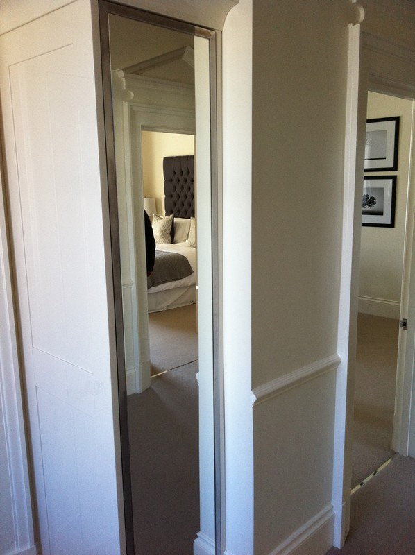 Full-length wardrobe mirror fitted in Soho home