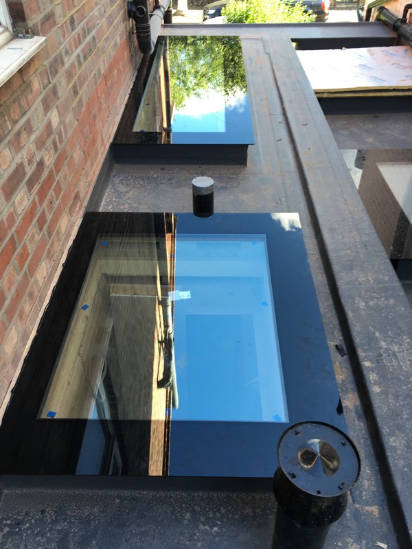 Multiple flat roof skylights on extension in Soho
